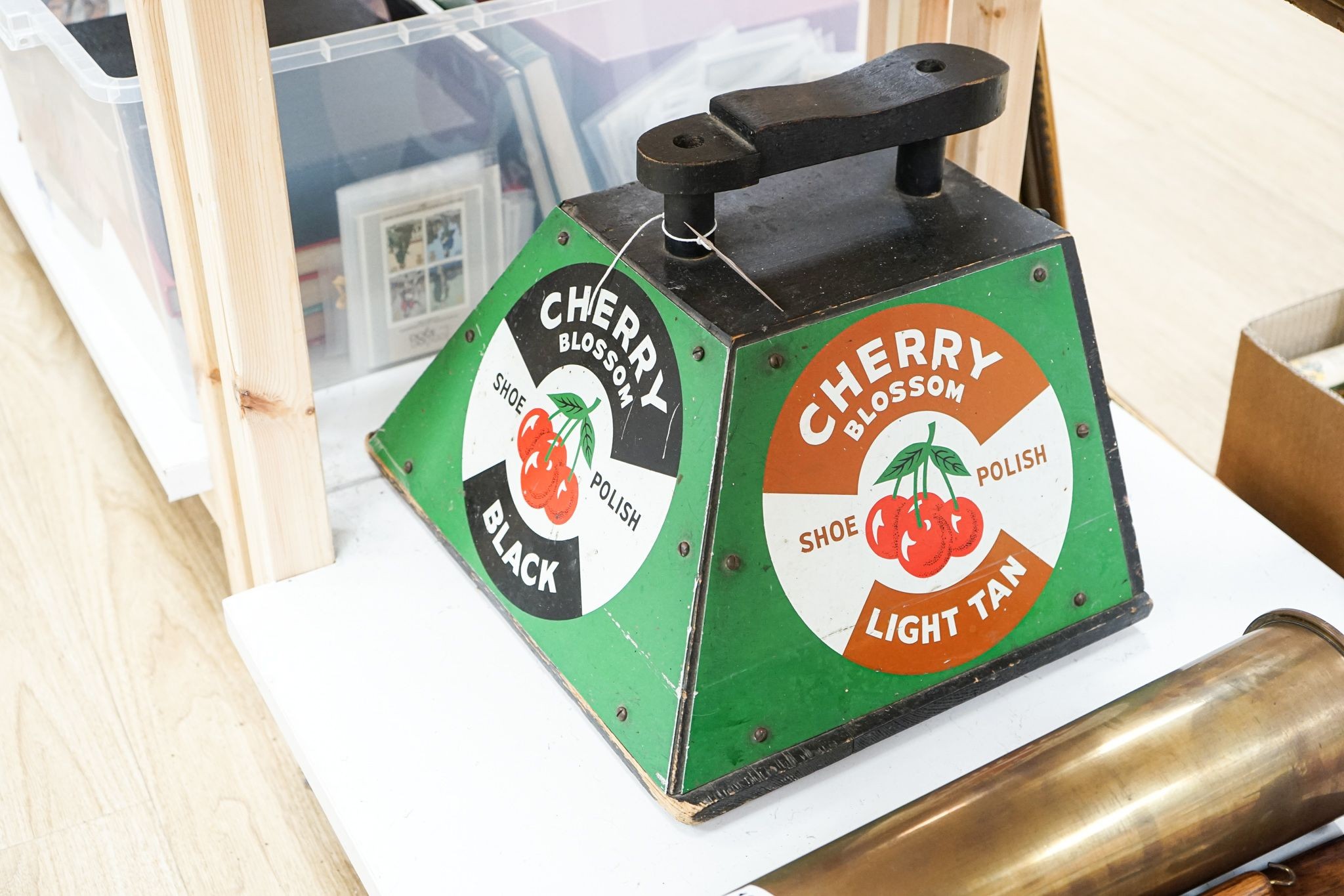 A Cherry Blossom Shoe Polish advertising shoe stand